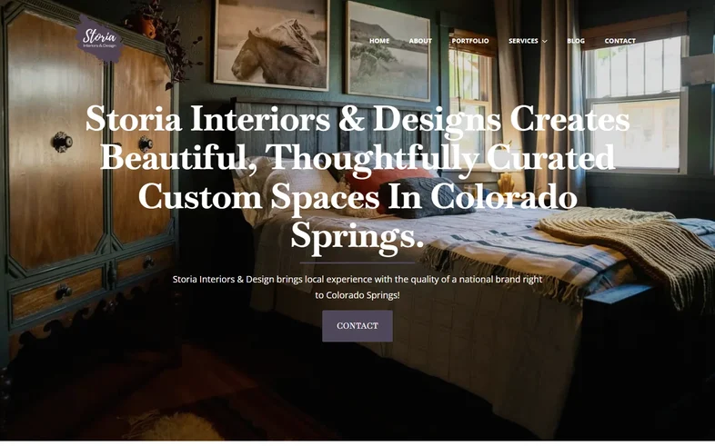 Storia Interiors & Designs homepage with a styled bedroom behind the headline